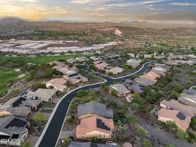 aerial view at dusk with a mountain view