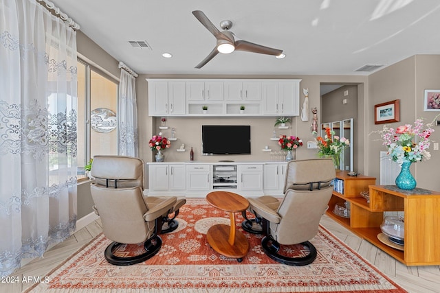 living room with ceiling fan