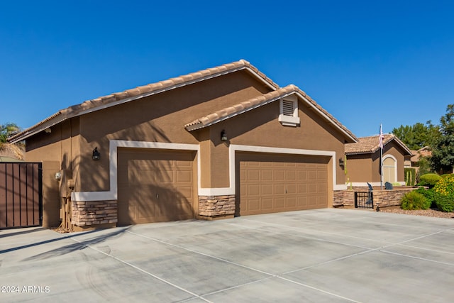 view of front of property with a garage