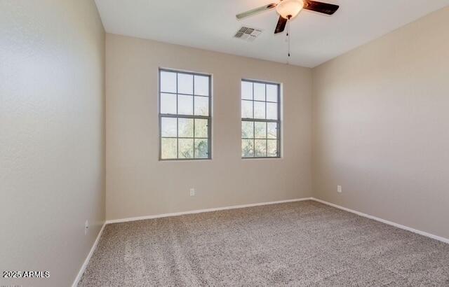 15105 W Glenrosa Ave, Goodyear, AZ 85395 - unfurnished room featuring ceiling fan, carpet flooring, and baseboards