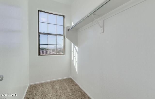 15105 W Glenrosa Ave, Goodyear, AZ 85395 - spacious closet featuring carpet