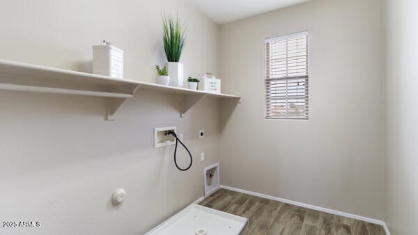 15105 W Glenrosa Ave, Goodyear, AZ 85395 - laundry room featuring hookup for a gas dryer, washer hookup, hookup for an electric dryer, wood finished floors, and baseboards