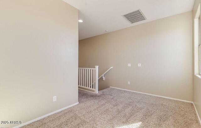 15105 W Glenrosa Ave, Goodyear, AZ 85395 - carpeted spare room featuring baseboards and recessed lighting