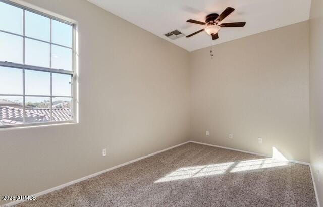 15105 W Glenrosa Ave, Goodyear, AZ 85395 - carpeted empty room with plenty of natural light, ceiling fan, and baseboards