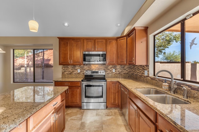 15232 S 36th Pl, Phoenix, AZ 85044 - kitchen with appliances with stainless steel finishes, a sink, tasteful backsplash, healthy amount of natural light, and recessed lighting