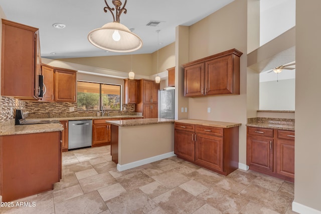 15232 S 36th Pl, Phoenix, AZ 85044 - kitchen with appliances with stainless steel finishes, backsplash, brown cabinets, pendant lighting, and high vaulted ceiling