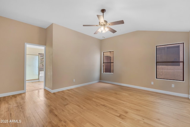 15232 S 36th Pl, Phoenix, AZ 85044 - spare room with light wood-type flooring, a ceiling fan, lofted ceiling, and baseboards