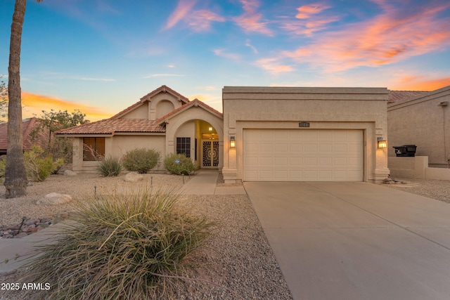 15232 S 36th Pl, Phoenix, AZ 85044 - view of front of property with a garage, stucco siding, concrete driveway, and a tile roof