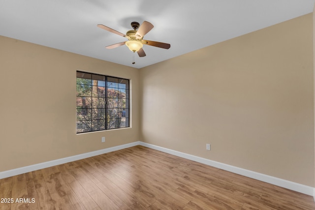 15232 S 36th Pl, Phoenix, AZ 85044 - unfurnished room with a ceiling fan, baseboards, and light wood-style floors