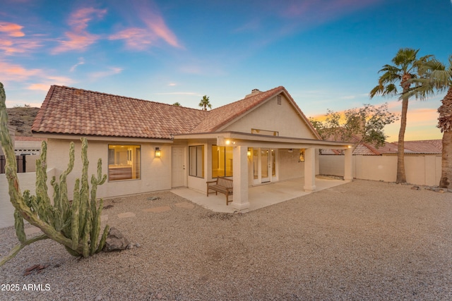 15232 S 36th Pl, Phoenix, AZ 85044 - back of property with stucco siding and a patio area