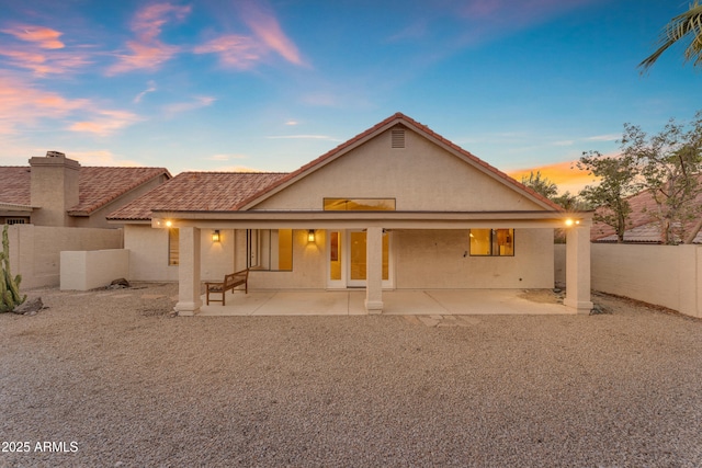 15232 S 36th Pl, Phoenix, AZ 85044 - back of property featuring stucco siding, a patio area, and a fenced backyard