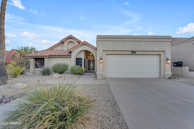 15232 S 36th Pl, Phoenix, AZ 85044 - mediterranean / spanish home with stucco siding, a garage, driveway, a tiled roof, and french doors