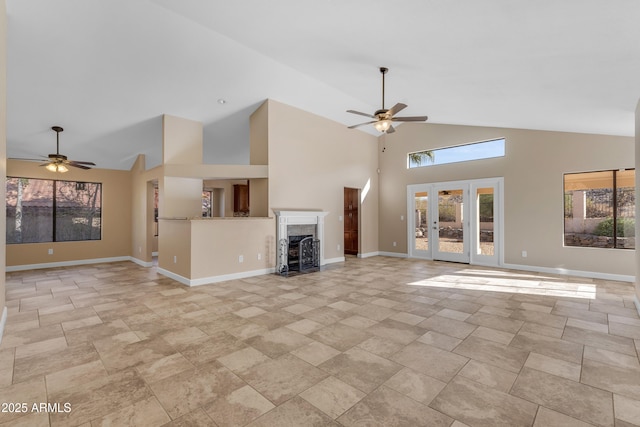 15232 S 36th Pl, Phoenix, AZ 85044 - unfurnished living room with a ceiling fan, high vaulted ceiling, a fireplace with flush hearth, and baseboards