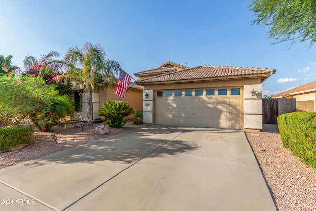 view of front of property featuring a garage