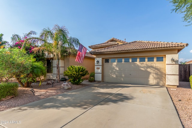 view of front of home with a garage