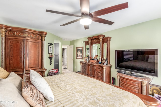 bedroom with ceiling fan and vaulted ceiling