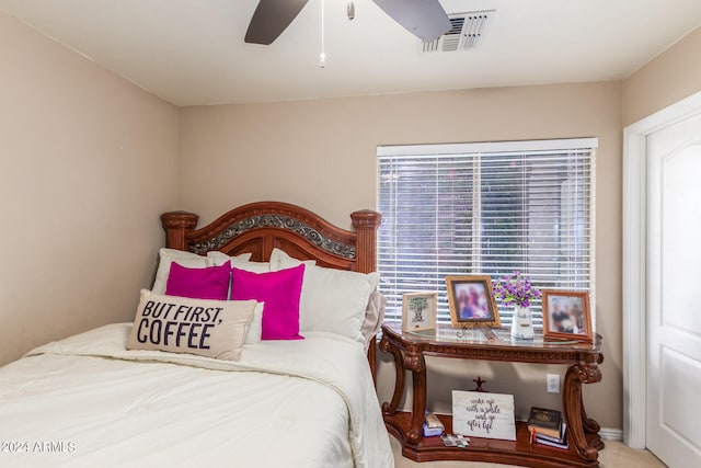 carpeted bedroom with ceiling fan