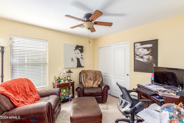 office space with light tile patterned flooring and ceiling fan