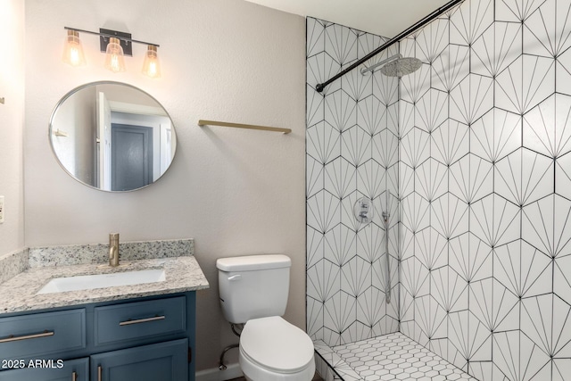 2914 W Marlette Ave, Phoenix, AZ 85017 - bathroom with vanity, a stall shower, and toilet