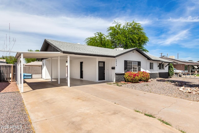 2914 W Marlette Ave, Phoenix, AZ 85017 - view of front of house with fence, driveway, and a carport