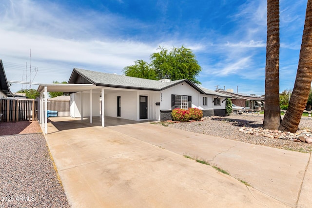 2914 W Marlette Ave, Phoenix, AZ 85017 - view of front of house with fence, driveway, and an attached carport