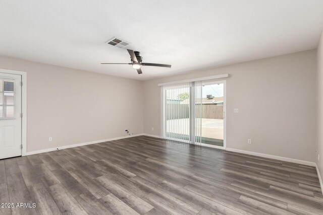 2914 W Marlette Ave, Phoenix, AZ 85017 - unfurnished room with visible vents, baseboards, ceiling fan, and wood finished floors