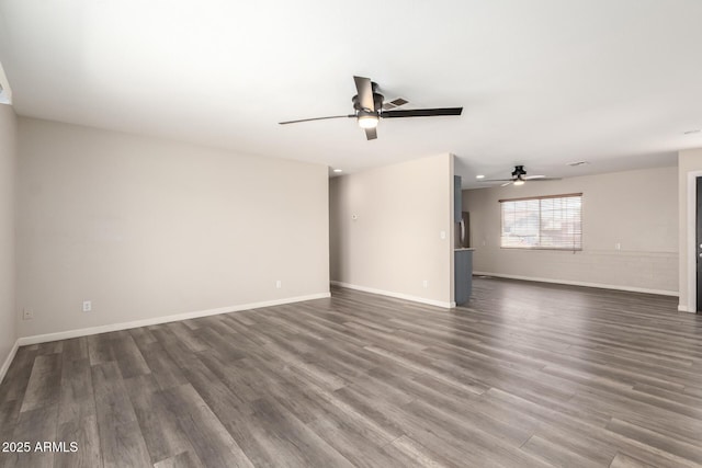 2914 W Marlette Ave, Phoenix, AZ 85017 - unfurnished living room with baseboards, ceiling fan, and dark wood-style flooring
