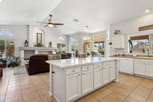 4401 E Barwick Dr, Cave Creek, AZ 85331 - kitchen featuring dishwasher, light tile patterned floors, ceiling fan, light countertops, and vaulted ceiling