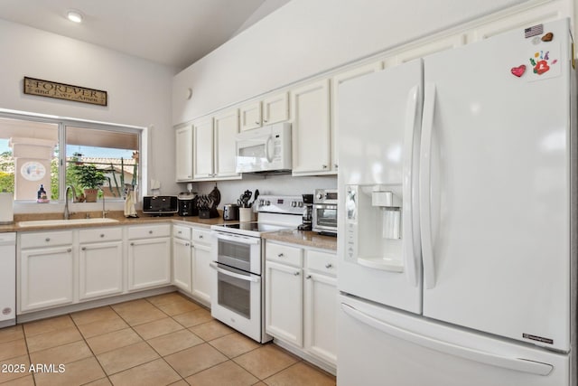 4401 E Barwick Dr, Cave Creek, AZ 85331 - kitchen featuring white appliances, a sink, light tile patterned floors, white cabinets, and light countertops