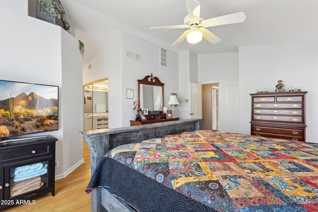 4401 E Barwick Dr, Cave Creek, AZ 85331 - bedroom featuring wood finished floors, high vaulted ceiling, ensuite bathroom, a ceiling fan, and baseboards