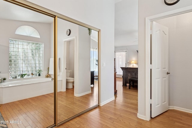 4401 E Barwick Dr, Cave Creek, AZ 85331 - hall featuring light wood-type flooring and baseboards