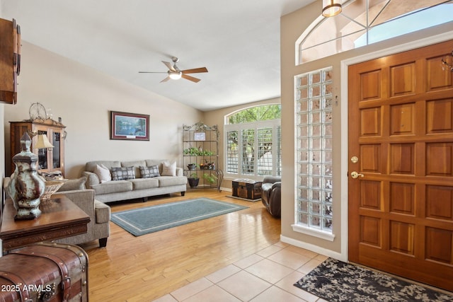 4401 E Barwick Dr, Cave Creek, AZ 85331 - entrance foyer featuring ceiling fan, lofted ceiling, light tile patterned flooring, and baseboards