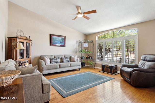4401 E Barwick Dr, Cave Creek, AZ 85331 - living room with vaulted ceiling, a ceiling fan, and wood finished floors