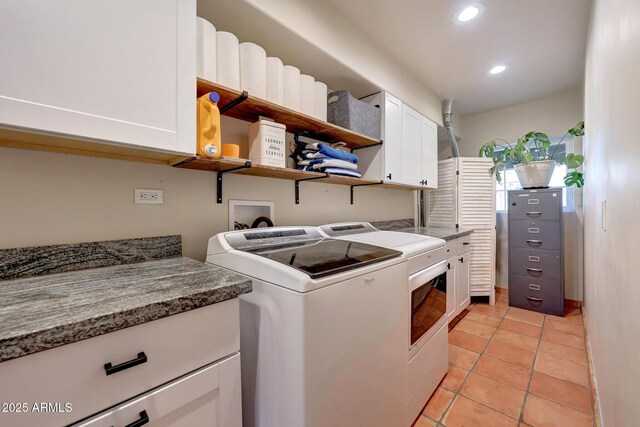 laundry room featuring separate washer and dryer, recessed lighting, cabinet space, and light tile patterned flooring