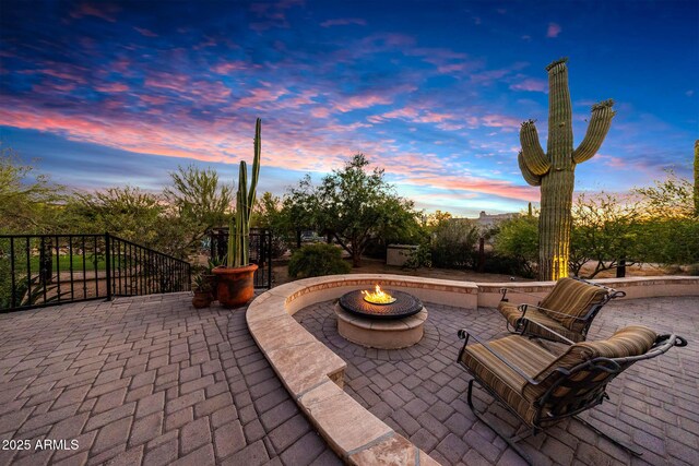 view of patio / terrace with a fire pit