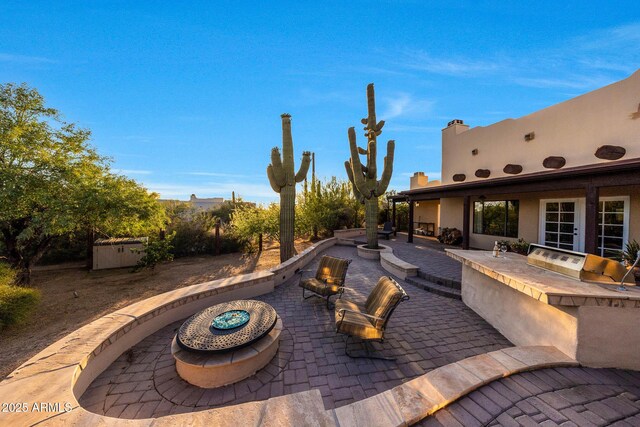 view of patio featuring exterior kitchen