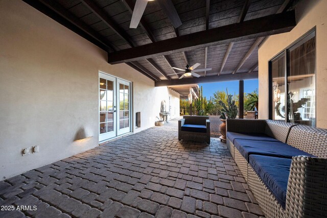 view of patio / terrace featuring a ceiling fan, outdoor lounge area, and french doors