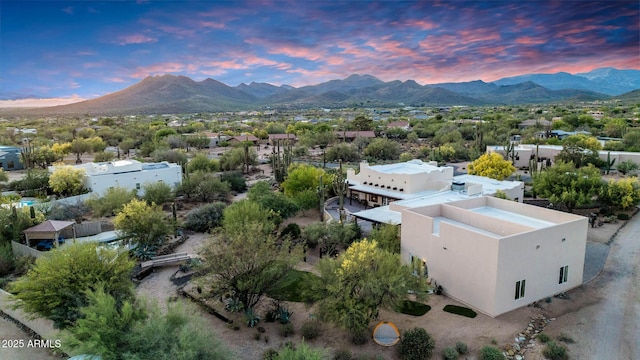 aerial view at dusk of a mountain view and a residential view