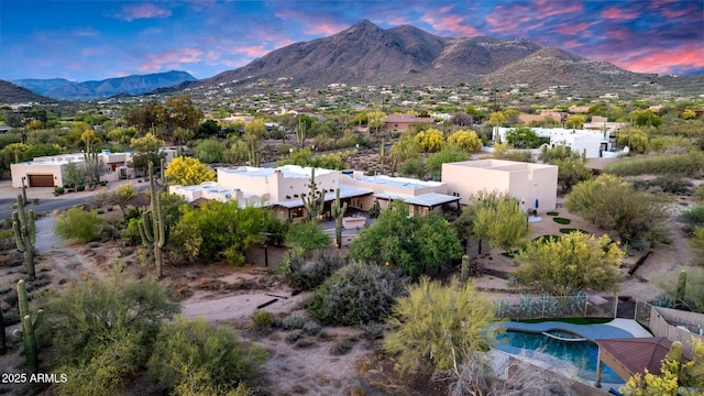 drone / aerial view of a mountain backdrop