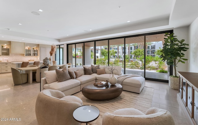 living room featuring light tile floors