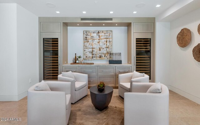 bar with light tile flooring and wine cooler