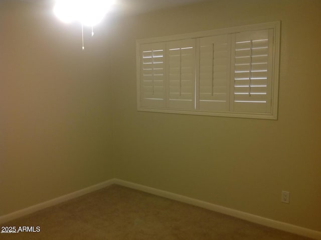 221 N Mountain Rd, Apache Junction, AZ 85120 - spare room featuring baseboards and carpet floors