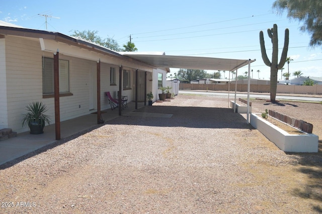 221 N Mountain Rd, Apache Junction, AZ 85120 - view of yard with an attached carport and gravel driveway