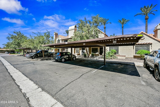 view of parking featuring a carport