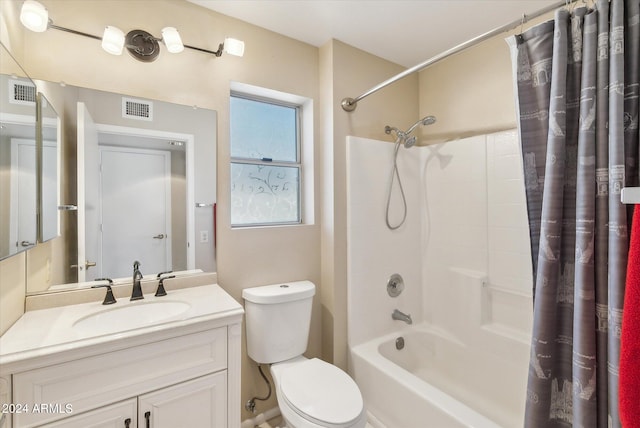 full bathroom featuring shower / bath combination with curtain, vanity, and toilet