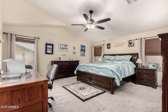bedroom featuring ceiling fan, visible vents, vaulted ceiling, and light colored carpet