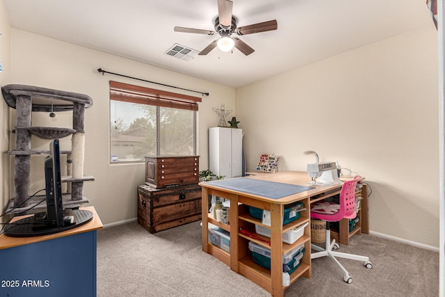 home office with baseboards, visible vents, carpet, and a ceiling fan