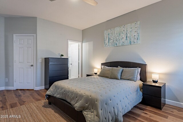 1702 W Wildwood Dr, Phoenix, AZ 85045 - bedroom featuring baseboards and wood finished floors