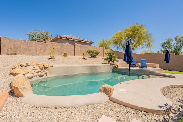 1702 W Wildwood Dr, Phoenix, AZ 85045 - view of pool with a fenced in pool, a patio, and a fenced backyard