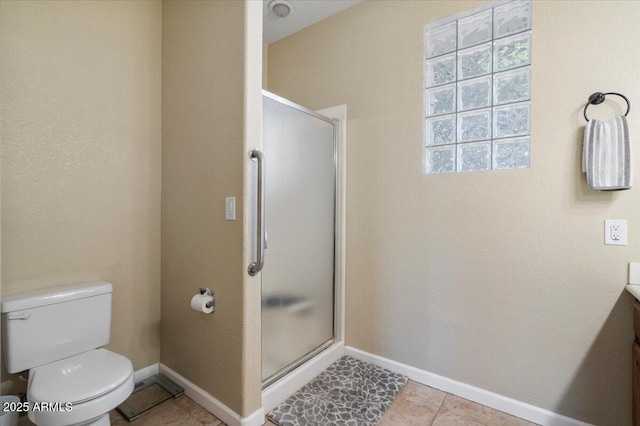 11025 E Nichols Ave, Mesa, AZ 85209 - bathroom with toilet, a shower stall, vanity, and baseboards